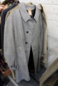 A gentlemen's Burberry grey and blue check raincoat.