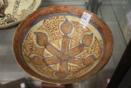 An early Islamic pottery bowl.