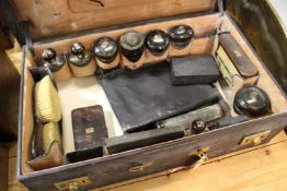 An Art Deco vanity case fitted with numerous tortoiseshell accessories.