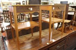 A pair of burr wood two tier single drawer bedside tables.