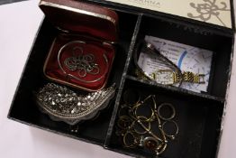 A small collection of gold and other rings, two ladies' wristwatches, an evening purse etc.