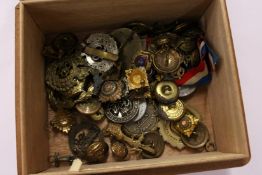 A good collection of military badges and buckles etc.