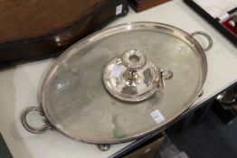 A plated twin handled oval tray and a chamber stick.