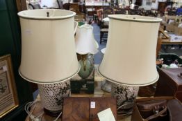 A good large pair of Chinese reticulated pottery jars / lamps.