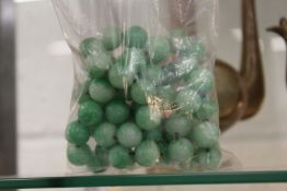 A string of large jadeite beads.