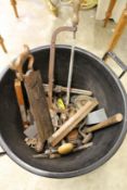 A bucket of old tools.