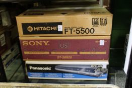 A Hitachi stereo tuner, a Sony stereo tuner and a Panasonic DVD player, all boxed.