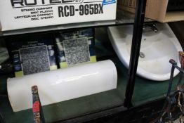 An old pedestal sink and other items.