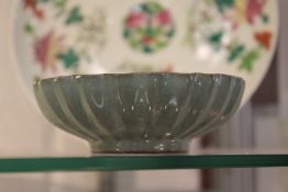 A small Chinese lotus shaped brush washer or bowl.