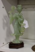 A Chinese carved jadeite figure of a Geisha.