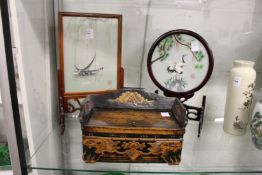 Two Japanese table screens and an oriental carved wood box.
