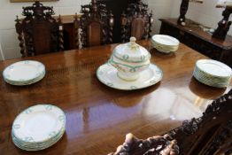 A quantity of porcelain dinner ware in the Minton style, early 20th century, white ground with