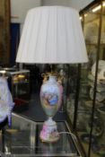 A continental porcelain lamp.