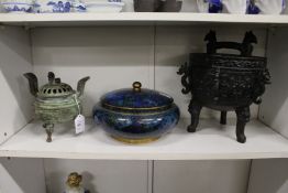 A bronze censer and cover, a cloisonne bowl and cover and an archaic bronze style ice bucket.