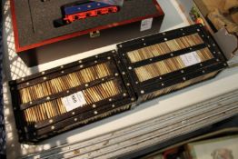 Two porcupine quill boxes.