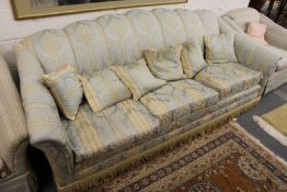 A classical style upholstered settee.