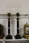 A large pair of decorative Corinthian column storm lanterns.