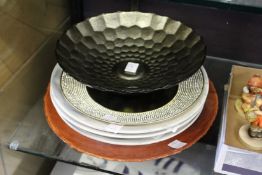 Decorative serving dishes and plates.