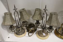 A good pair of plated twin branch table lamps.