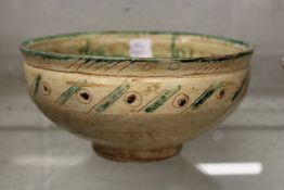 An early Islamic pottery bowl.