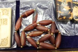 A hardstone bead necklace.