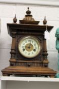 A good walnut cased mantle clock.