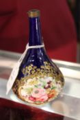 A Chamberlains Worcester small bottle vase painted with flowers.