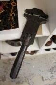 An unusual early double sided adjustable wrench.