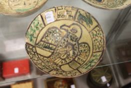 An early Islamic pottery bowl.