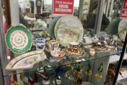 A good shelf of decorative china.