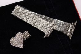 A decorative bracelet and ring.