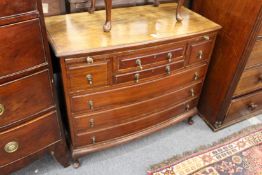 A mahogany bow front multi drawer chest.