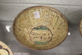 An early Islamic pottery bowl.