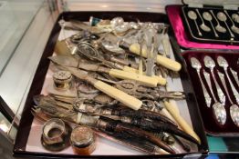 A good collection of silver and other items to include grape scissors, teaspoons, button hooks