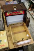 A treasure chest game and a Henri Winterman's display box.