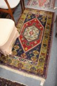 A small Persian rug.