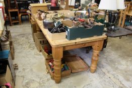 A heavy pine kitchen table.