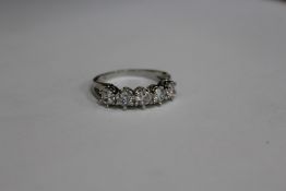 A decorative silver ring.