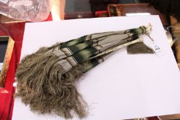 A small Edwardian ivory handled folding parasol.