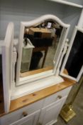 A whitewood dressing table mirror.