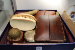 Leather travelling photograph cases, hand brushes, pens, a telescope and other miscellaneous