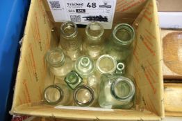 Early milk bottles and other items.