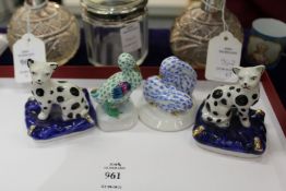 A Herend small porcelain model of two rabbits, one of a bird and two other porcelain figures.