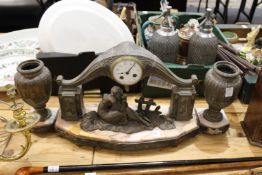 An Art Nouveau clock garniture.