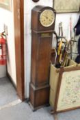 An oak cased grandmother clock.