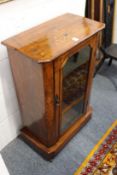 A Victorian inlaid walnut music cabinet.