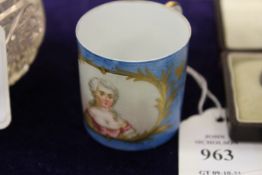 A small Sevres coffee can painted with a female portrait bust.