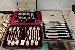 A good cased set of twelve silver coffee spoons with matching sugar tongs, a cased set of silver