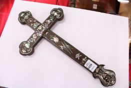 A mother-of-pearl inlaid hardwood crucifix.