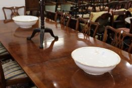 A good large pair of Minton white porcelain circular bowls with gilded rims and armorials.
